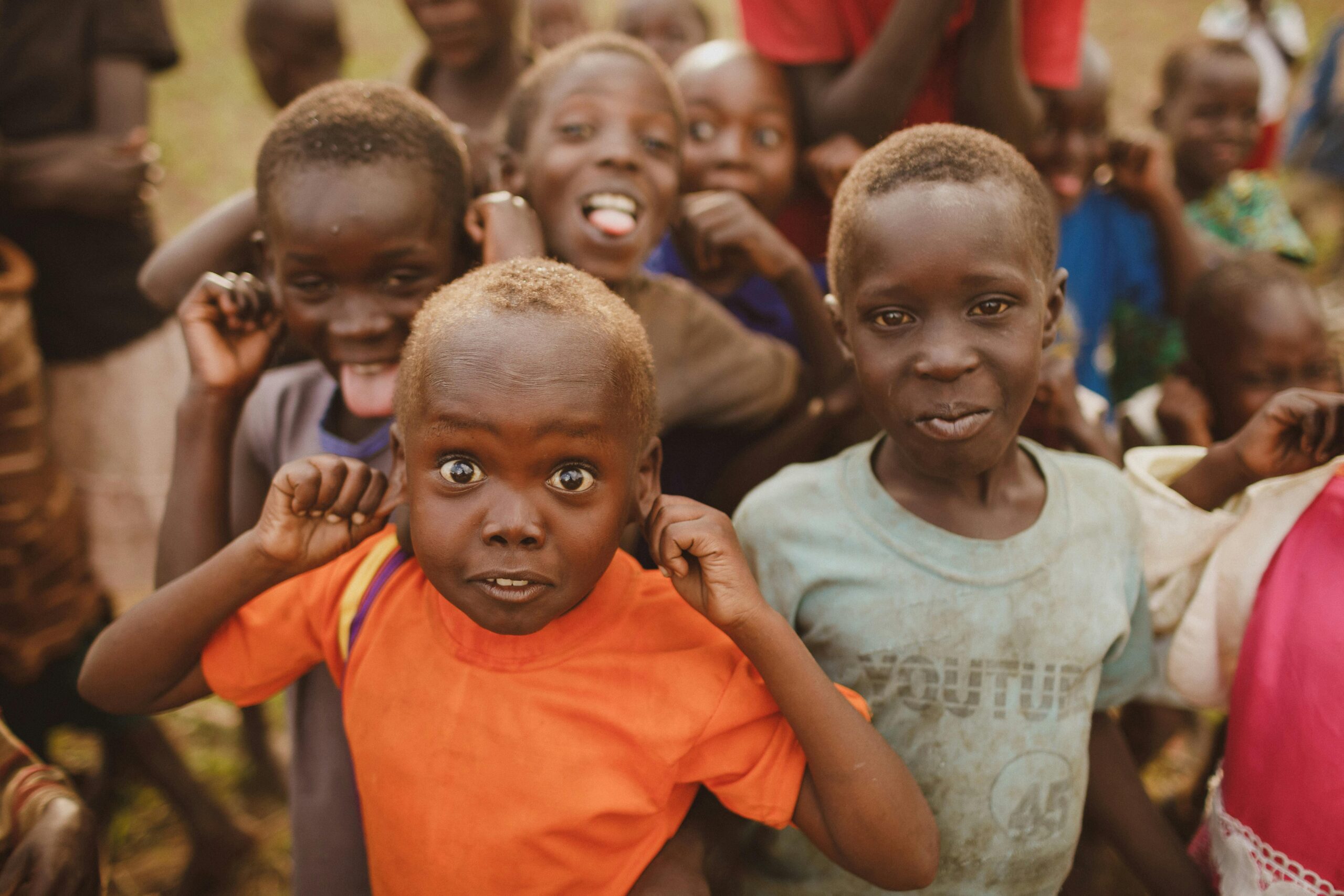 A group of playful children enjoying their time outdoors in Lira, Northern Uganda.
